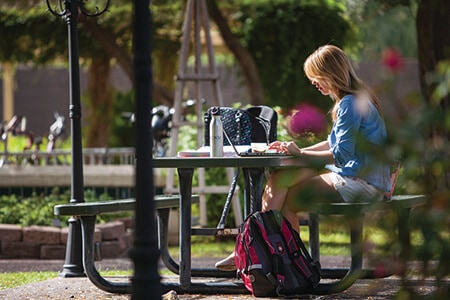 Sonoran | Student outside at Table